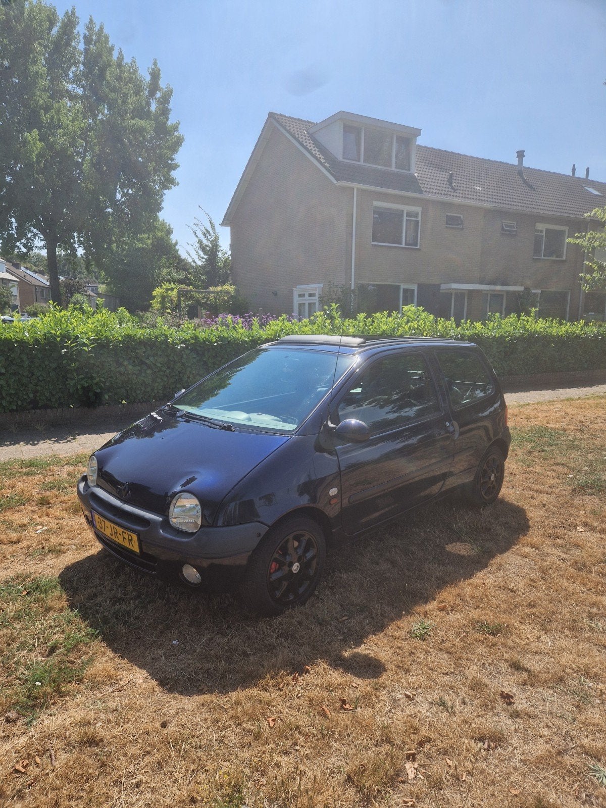 Renault Twingo 1.2 16V initiale 2002 Blauw, Auto's, Renault, Voorwielaandrijving, 4 cilinders, Lederen bekleding, Handgeschakeld