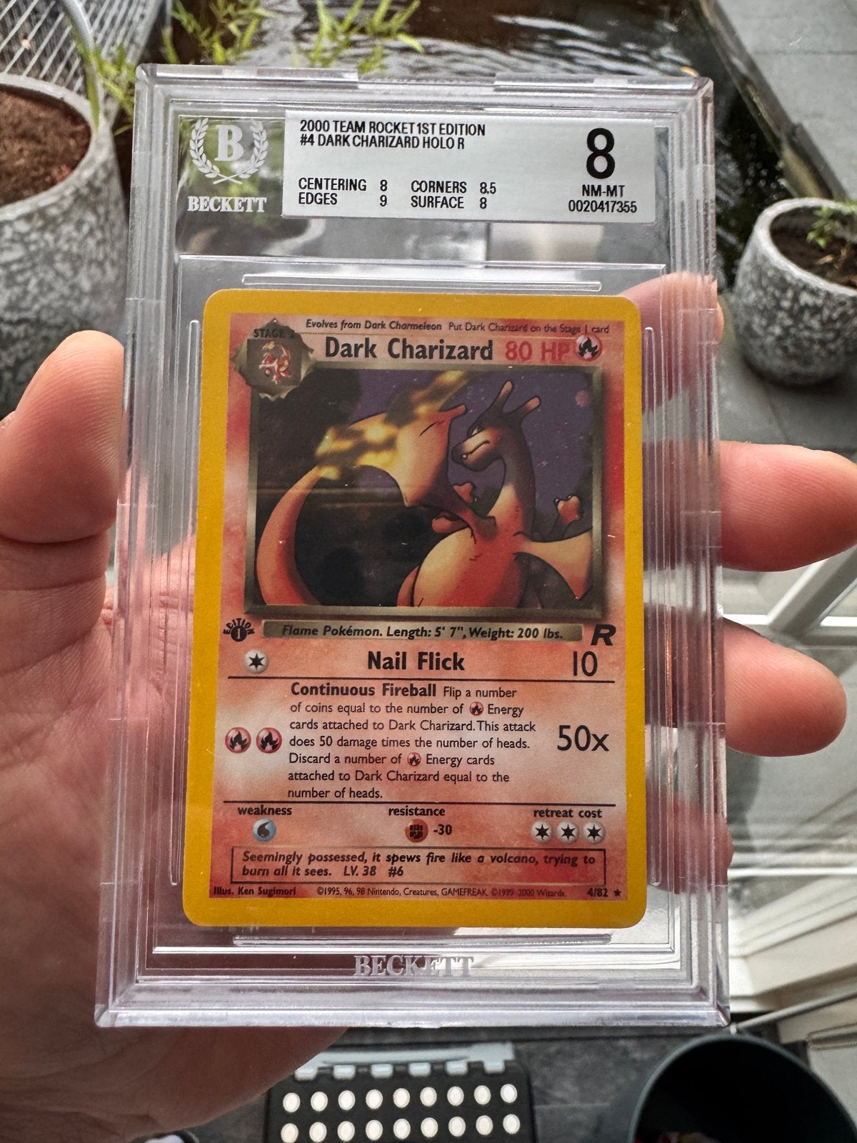 Dark Charizard Holo 1st Edition BGS 8 Team Rocket, Hobby en Vrije tijd, Verzamelkaartspellen | Pokémon, Ophalen of Verzenden, Zo goed als nieuw