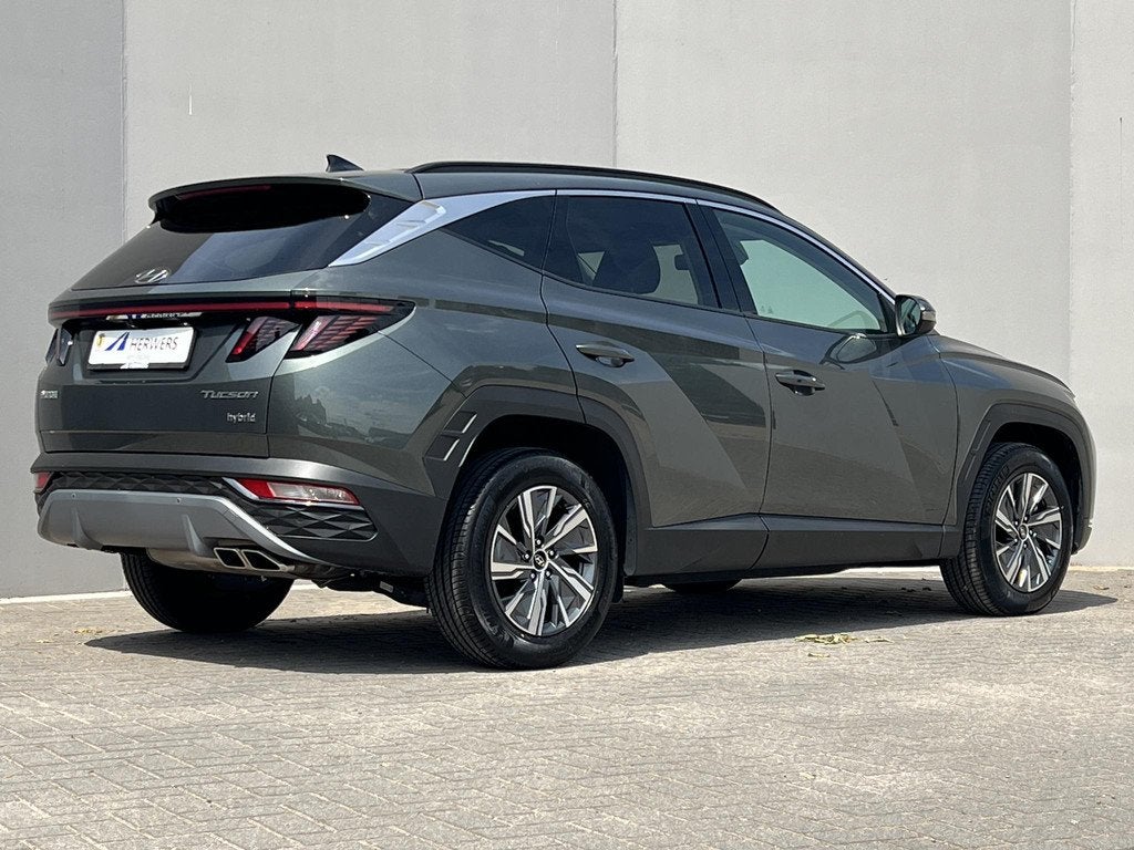 Hyundai Tucson 1.6 T-GDI HEV Comfort 4WD / Fabrieksgarantie, Auto's, Hyundai, Stof, Gebruikt, Euro 6, 4 cilinders