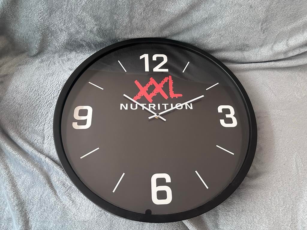 XXL Nutrition Wandklok, Huis en Inrichting, Woonaccessoires | Klokken, Ophalen of Verzenden, Nieuw, Analoog, Wandklok