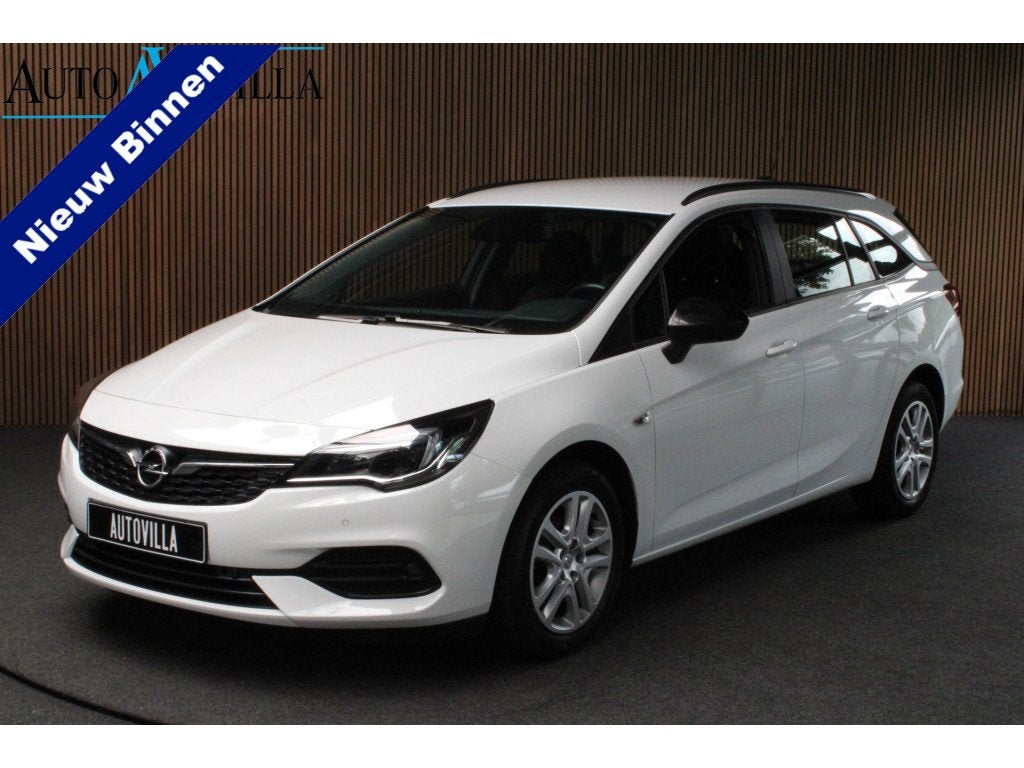 Opel Astra Sports Tourer 1.2T Navi Stoel- & stuurverw. Airco, Voorwielaandrijving, Dealer onderhouden, Zwart, 1199 cc
