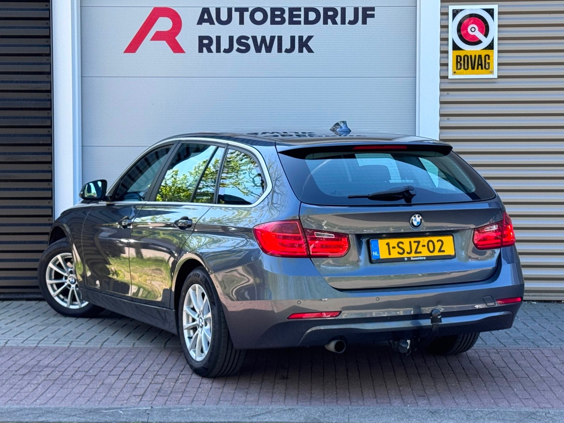 BMW 3-serie Touring 316i Executive Upgrade Navi/Trekhaak, Auto's, Gebruikt, Euro 6, 4 cilinders, Origineel Nederlands