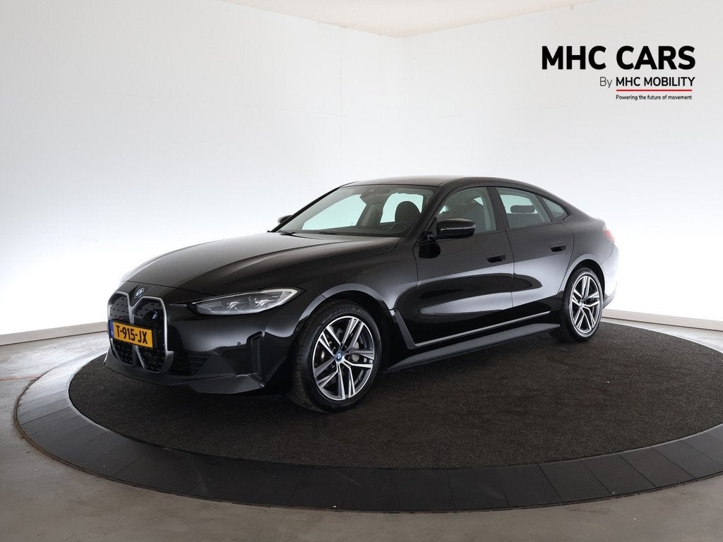 BMW i4 eDrive40 84 kWh (bj 2023, automaat), Auto's, BMW, Achterwielaandrijving, Leder en Stof, Origineel Nederlands, Te koop
