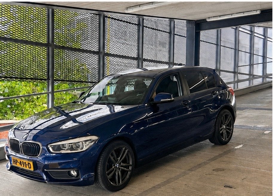 BMW 1-Serie 1.5 118I 5DR AUT 2015 Blauw, Auto's, 1295 kg, Blauw, Origineel Nederlands, 650 kg