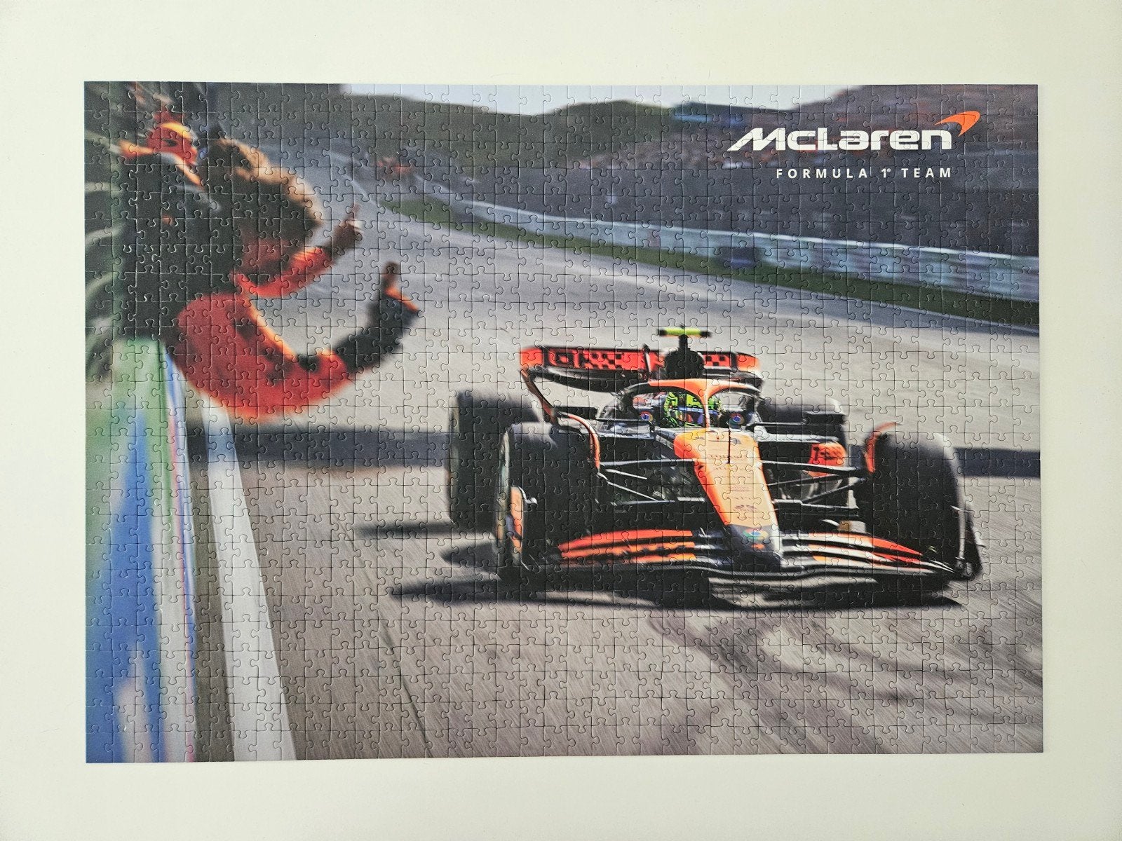 Lando Norris McLaren puzzel officieel F1, Ophalen of Verzenden, 500 t/m 1500 stukjes, Zo goed als nieuw, Legpuzzel