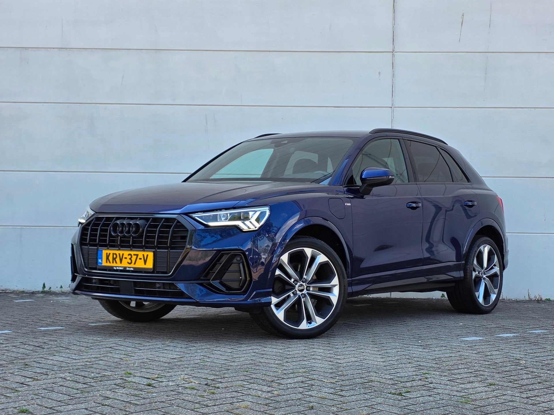 Audi Q3 45 TFSIe |3x S-Line| 20''|1e EIG.|Trekhaak|Sonos|Sto, Auto's, Gebruikt, Zwart, Blauw, Leder en Stof