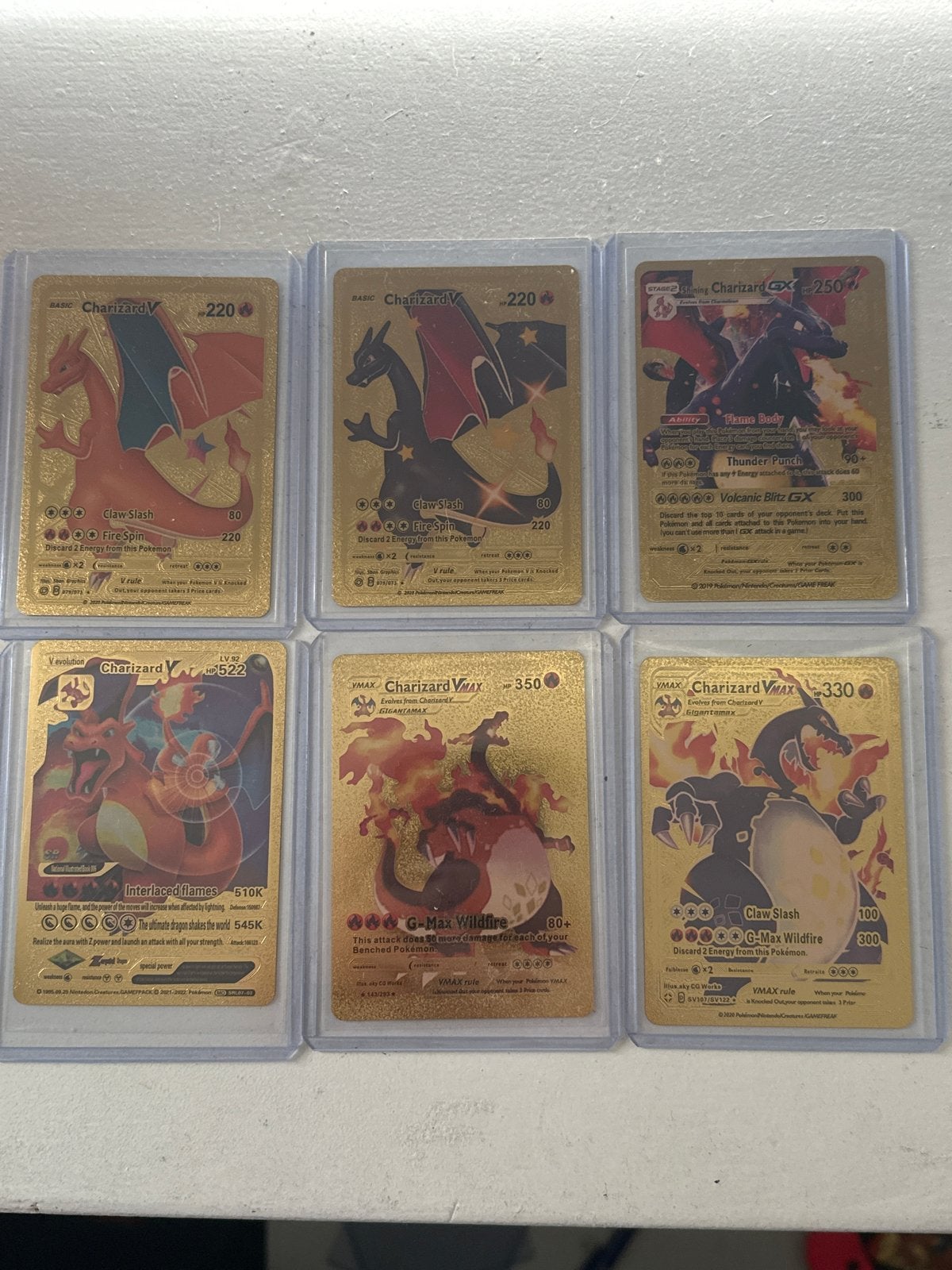 6 Gouden Charizard Pokémon Kaarten, Hobby en Vrije tijd, Verzamelkaartspellen | Pokémon, Ophalen of Verzenden, Zo goed als nieuw