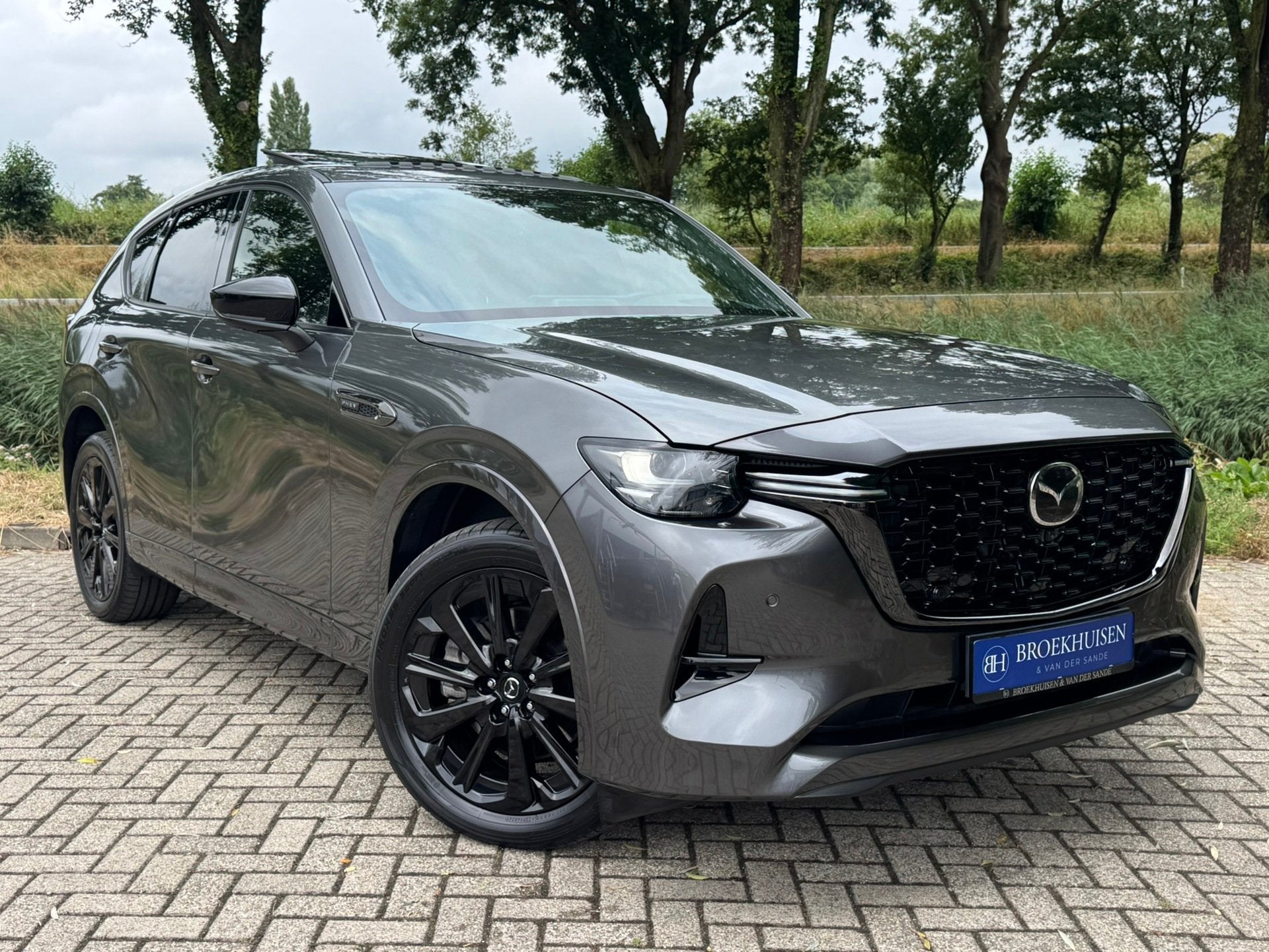 Mazda CX-60 2.5 e-SkyActiv PHEV Homura Plus 327pk Panoramada, Automaat, Gebruikt, Zwart, 4 cilinders