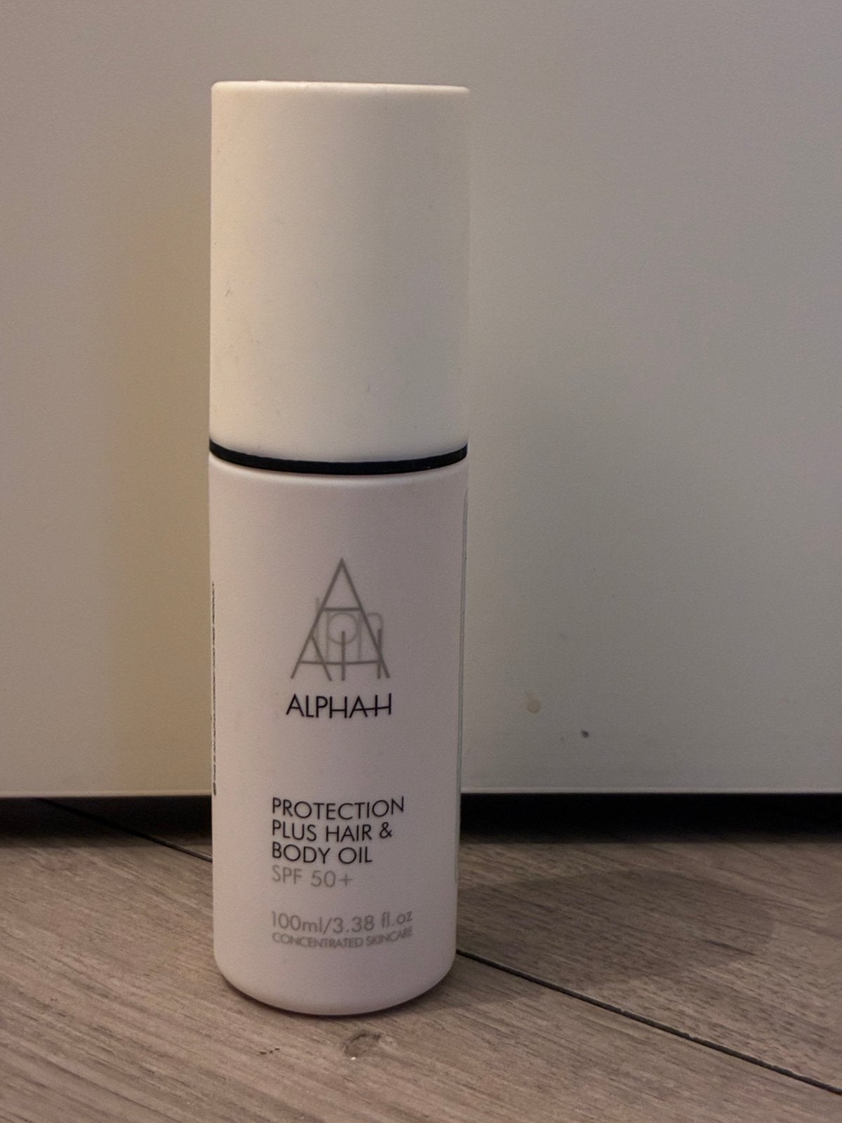Alpha-H protection plus hair & body oil SPF 50+ 100 ml, Sieraden, Tassen en Uiterlijk, Uiterlijk | Lichaamsverzorging, Ophalen of Verzenden