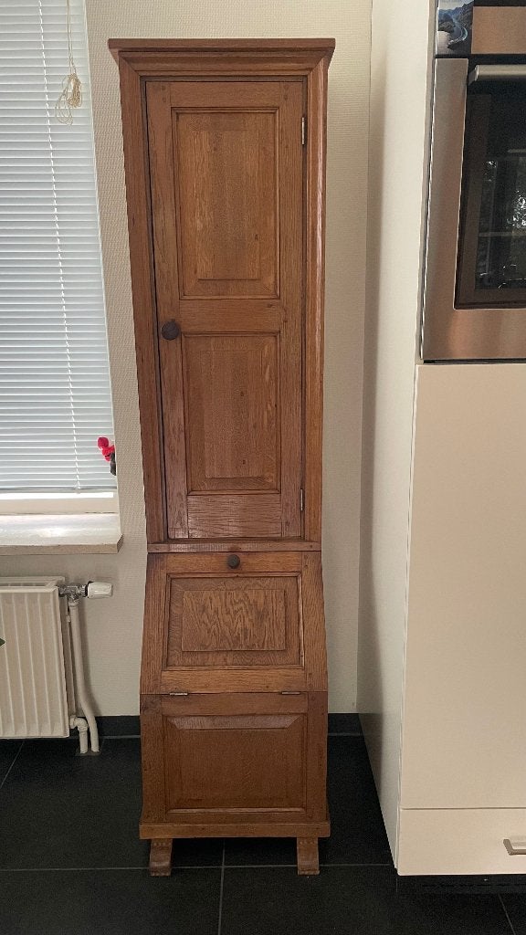 Antieke houten drankkast, Ophalen