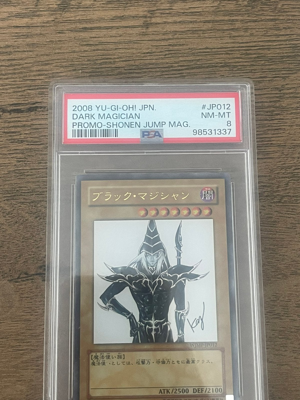 Dark Magician 2008 Shonen Jump magazine Japans PSA 8 graded, Ophalen of Verzenden, Zo goed als nieuw