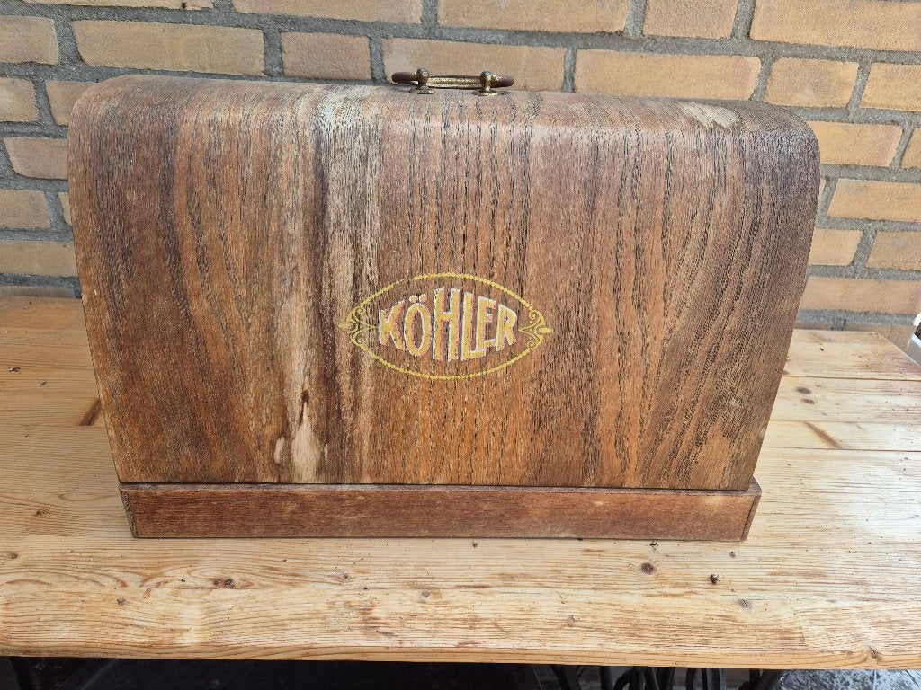 Kohler antieke naaimachine, Ophalen