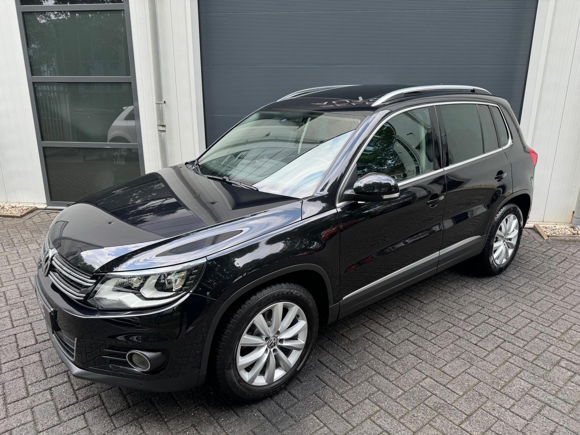 Volkswagen Tiguan 1.4 TSI Sport & Style 122 Pk Pano/Xenon/Le, Voorwielaandrijving, Dealer onderhouden, 15 km/l, 4 cilinders