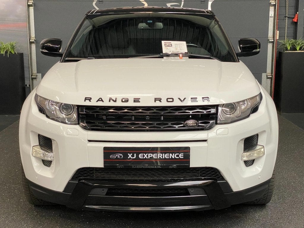 Land Rover RANGE ROVER EVOQUE 2.0 Si 4WD Dynamic LEER NAVI T, Auto's, Land Rover, Automaat, Euro 5, Zwart, Wit
