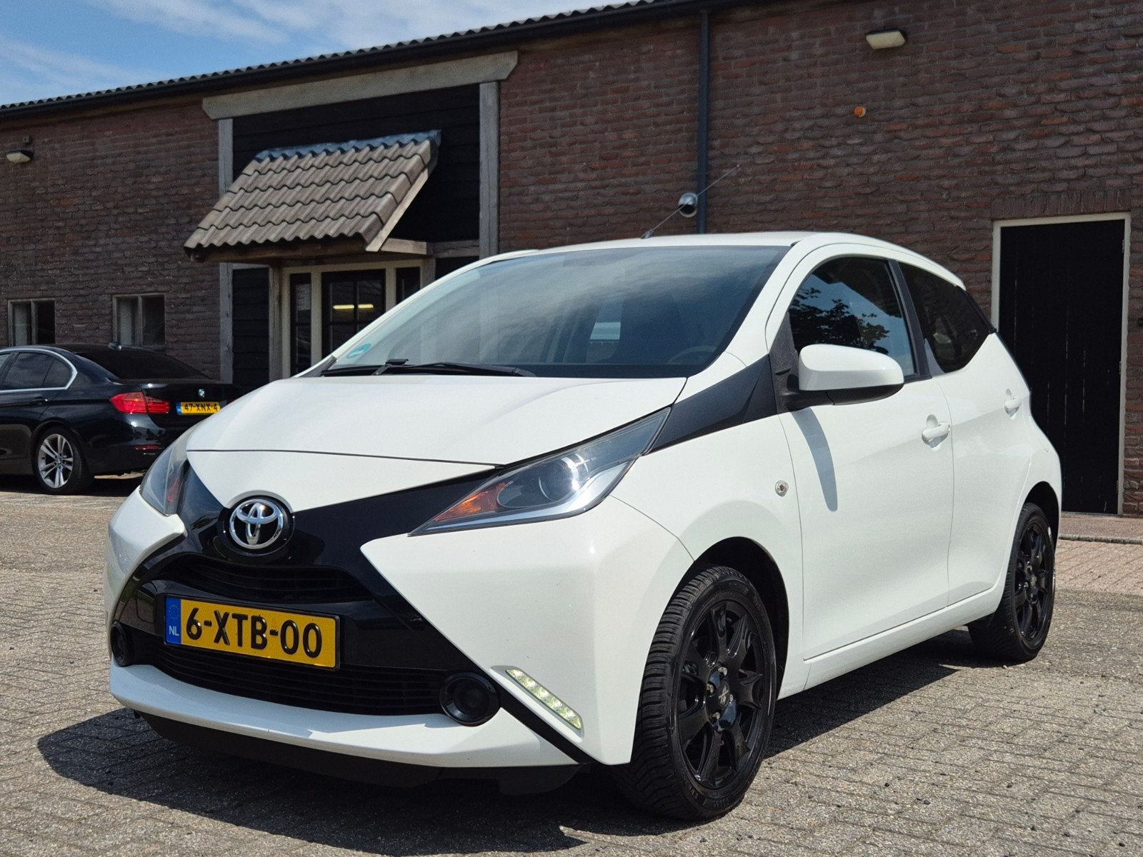 Toyota Aygo 1.0 12V Vvt-i Ddrs 2015 Wit I Airco I Camera I C, Auto's, Toyota, Voorwielaandrijving, Stof, Euro 6, Met garantie (alle)