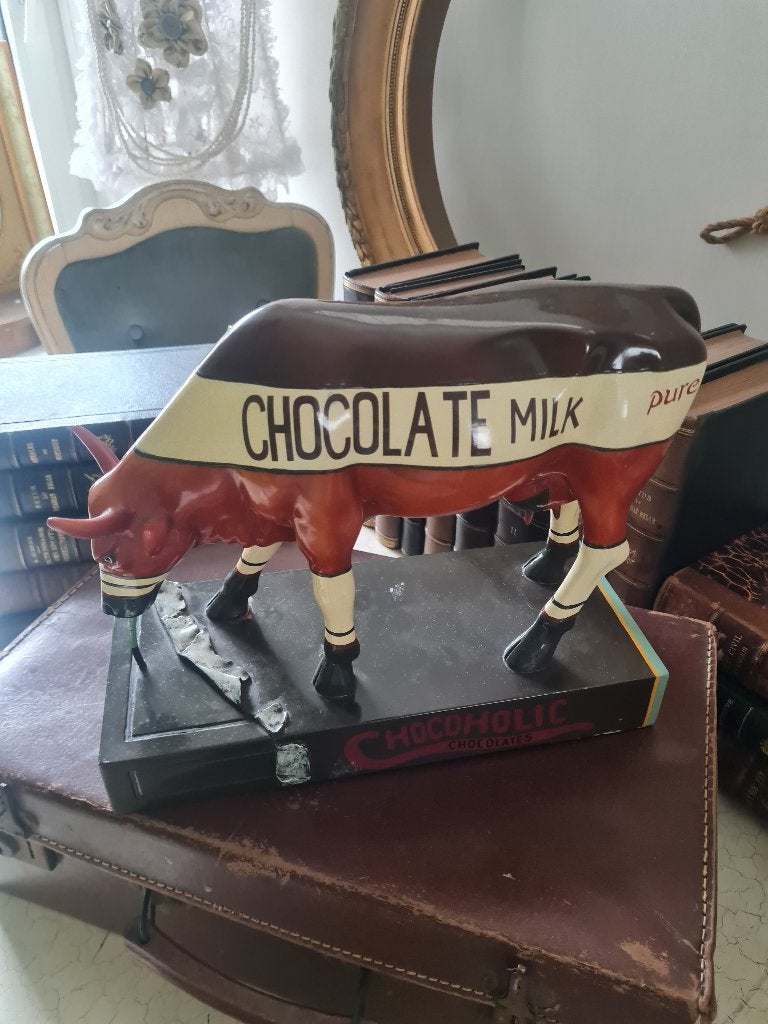 Zeer oud beeld koe chocalade melk reclame