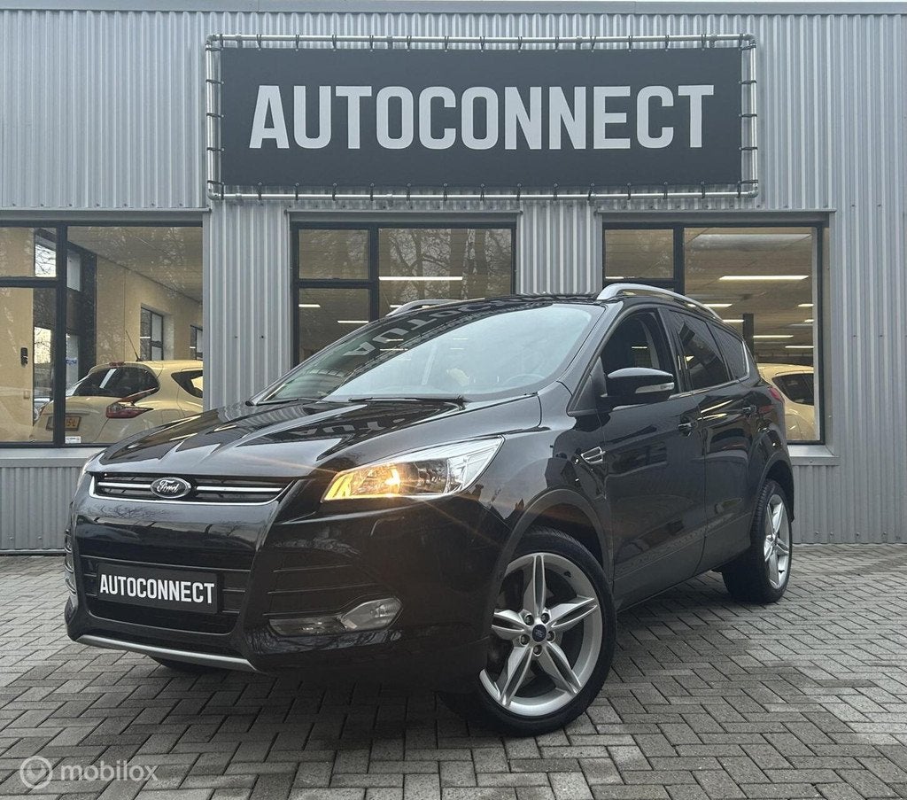 Ford Kuga 1.5 Titanium 4WD NAVI, LEDER, CRUISE, 1e EIGENAAR, Automaat, Zwart, 4 cilinders, 1586 kg