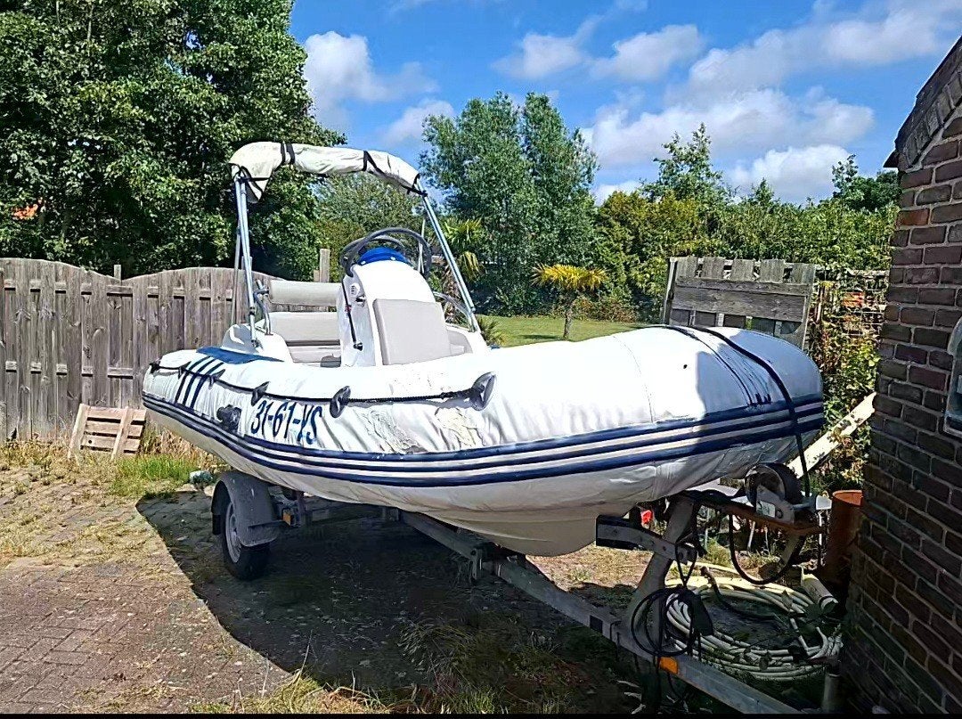 Johnson 40pk rubberboot met trailer, Watersport en Boten, Gebruikt, Ophalen of Verzenden, Inclusief motor, Polyester/glasvezel