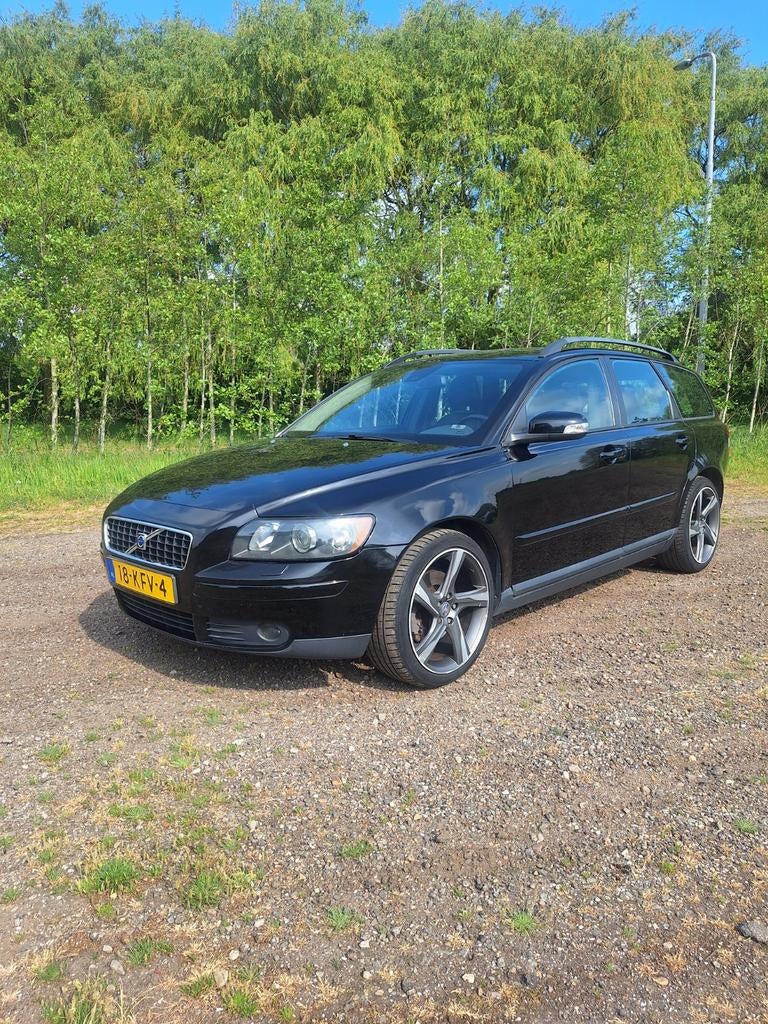 Volvo V50 2.5T Momentum 122.000, Auto's, Volvo, 1518 kg, Zwart, 700 kg, Lederen bekleding