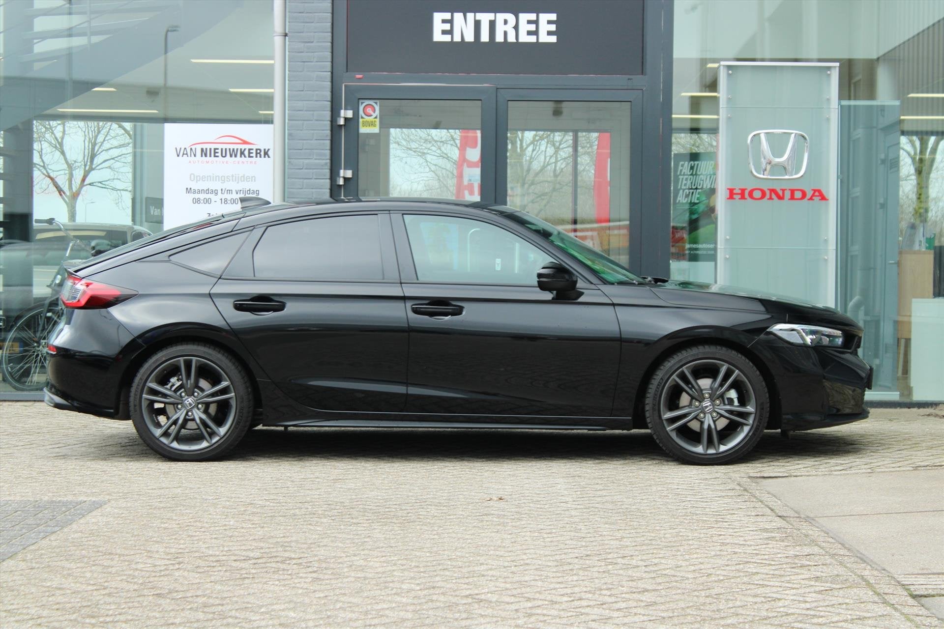 Honda Civic 2.0 HYBRID 184PK Automaat Sport Black Emblem Pac, Auto's, Honda, 12 maanden, Gebruikt, 4 cilinders, Leder en Stof