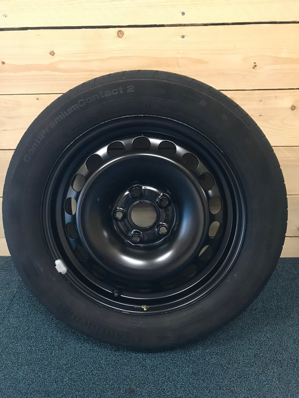 Band passat met velg, Ophalen, Gebruikt