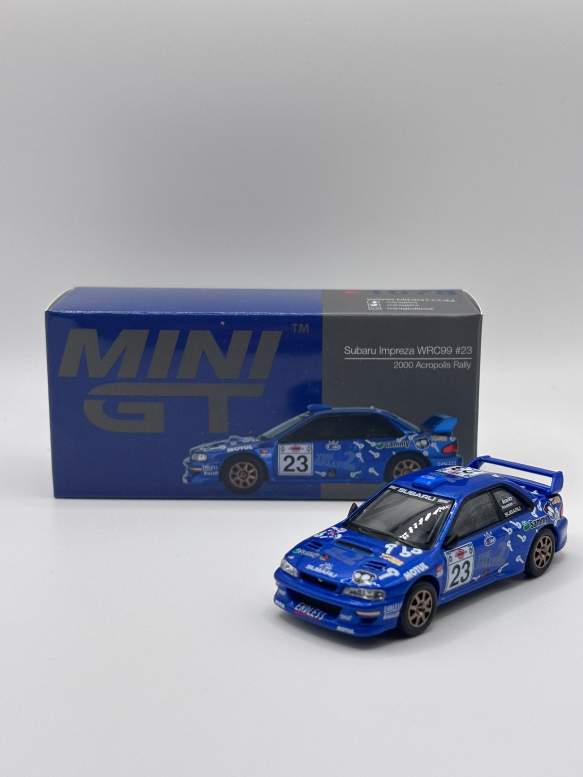 Mini GT - Subaru Impreza WRC99 #23 2000 Acropolis Rally, Www.rubensmodelautos.nl, Auto, Nieuw, Ophalen of Verzenden