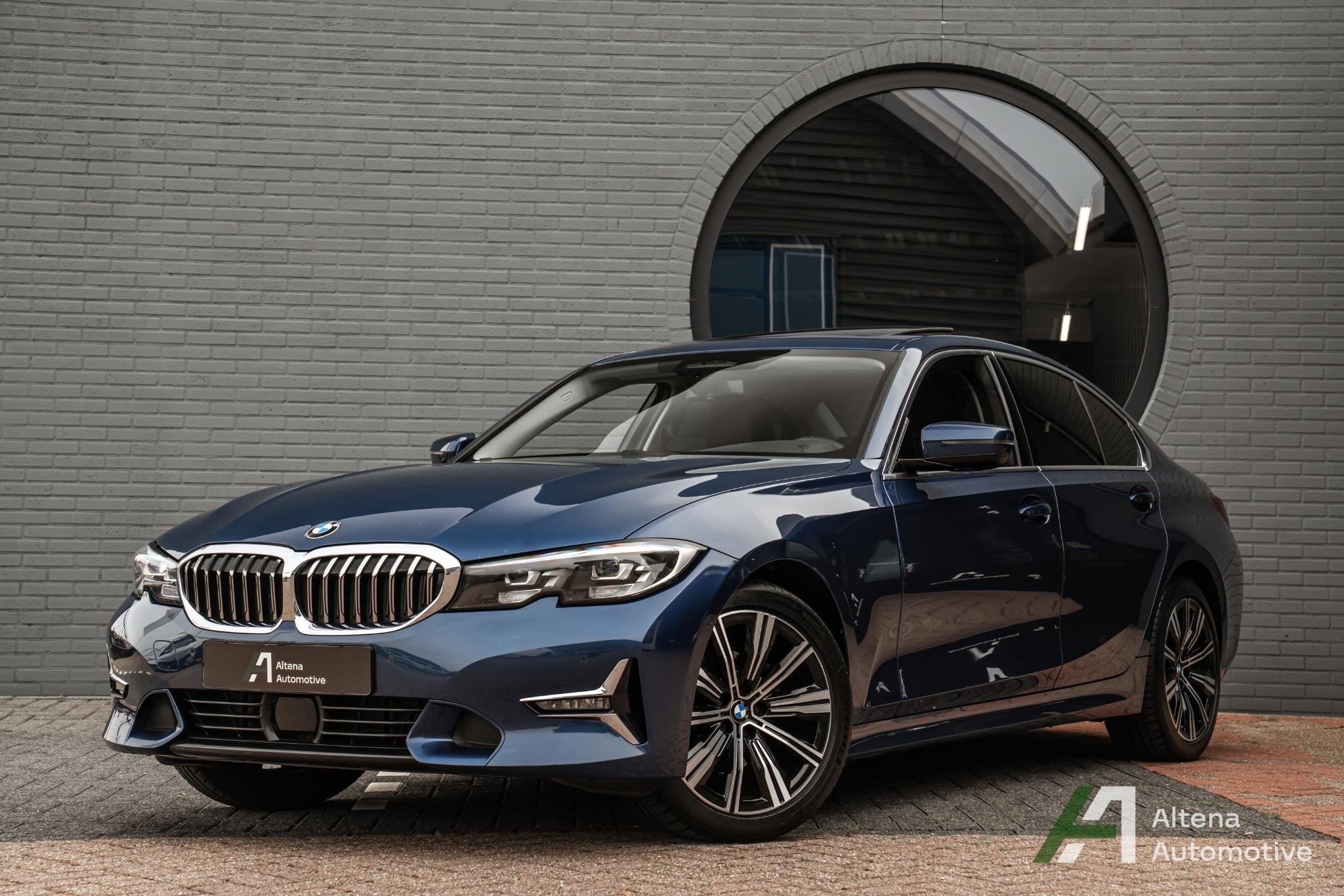 BMW 3-serie 320i xDrive High Executive Luxury line, trekhaak, Auto's, Automaat, 4 cilinders, Blauw, Leder