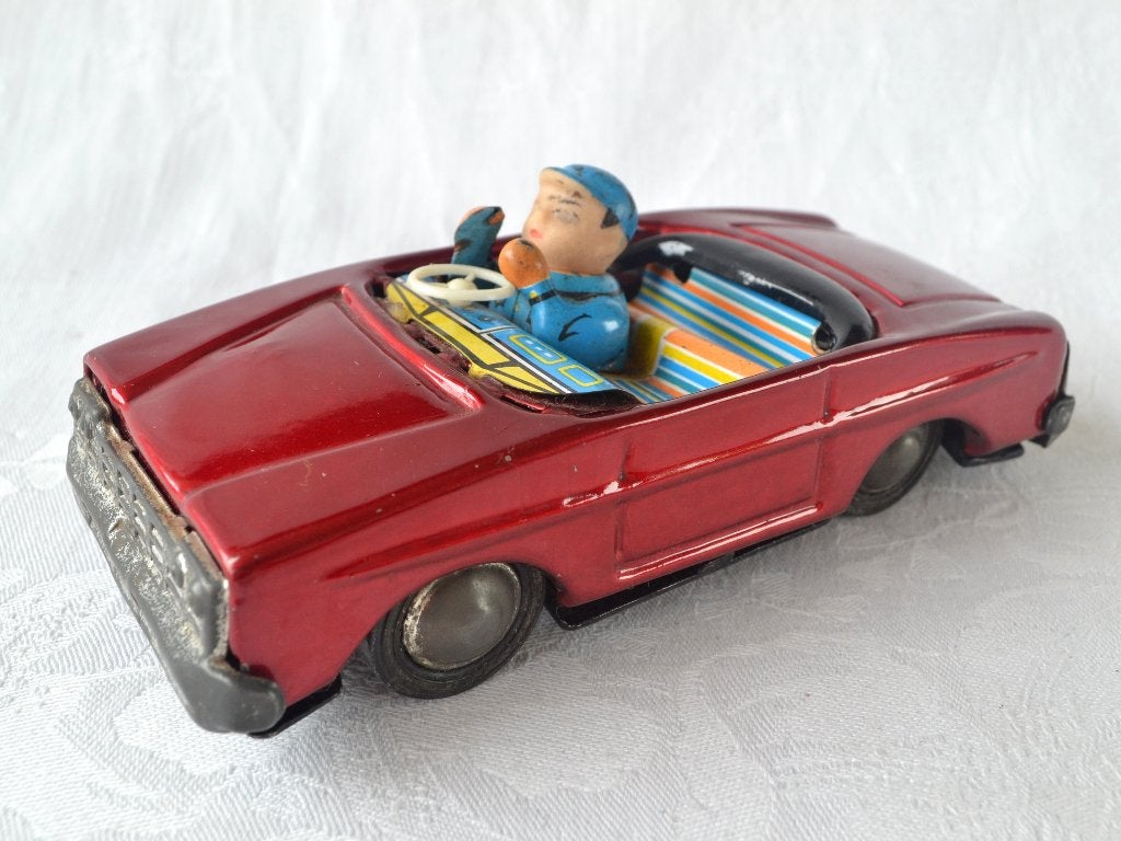 Oude blikken speelgoed auto, Rode cabriolet modelauto ca1970, Ophalen of Verzenden