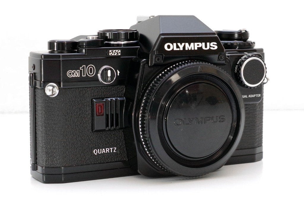 Olympus OM10 Quartz body 35mm film SLR + nieuwe batterijen, Verzenden, Refurbished, Spiegelreflex, Olympus