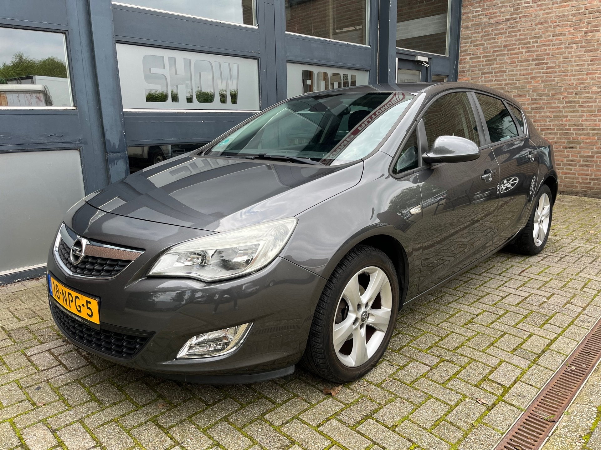 Opel Astra 1.4 Edition, Auto's, Opel, Voorwielaandrijving, Euro 5, Gebruikt, 4 cilinders