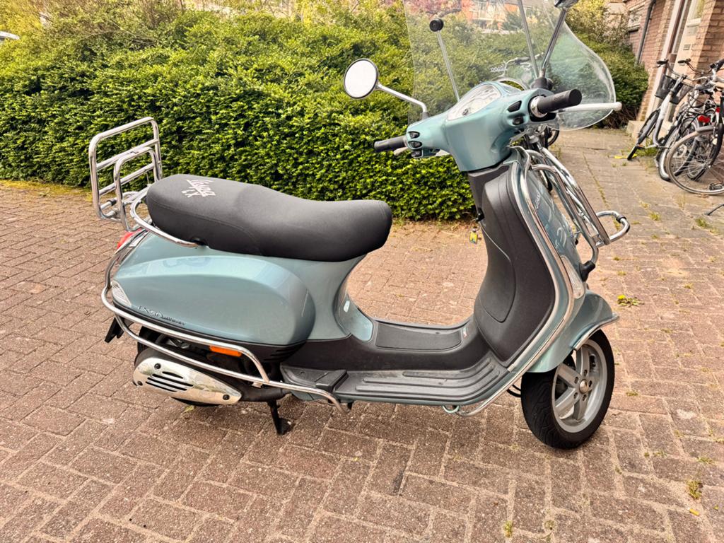 Vespa LX Scooter - Goed onderhouden en klaar voor de weg!, Ophalen, Gebruikt, Maximaal 45 km/u, Benzine
