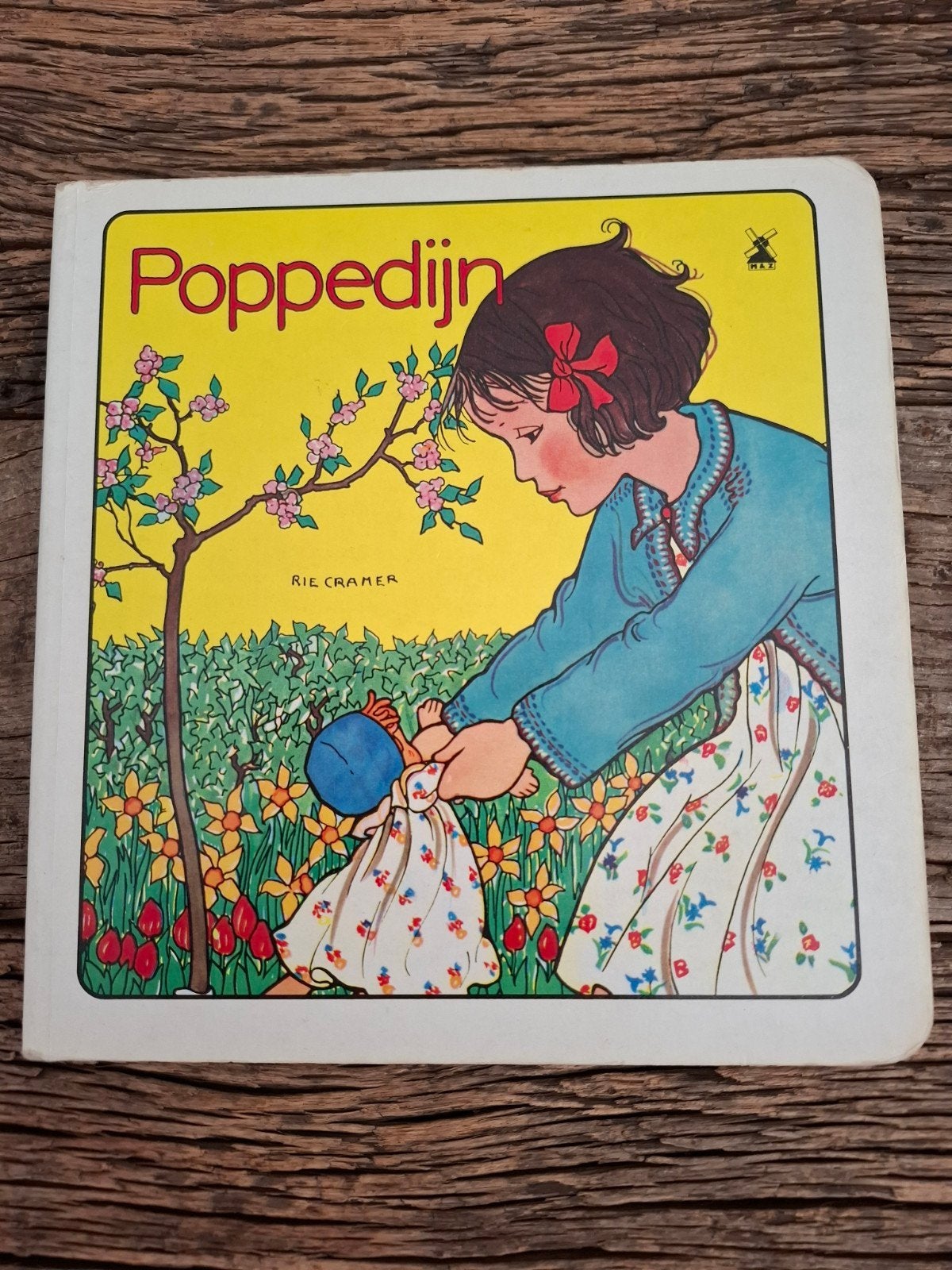 Kinderboekje Rie Cramer, Poppedijn., Ophalen