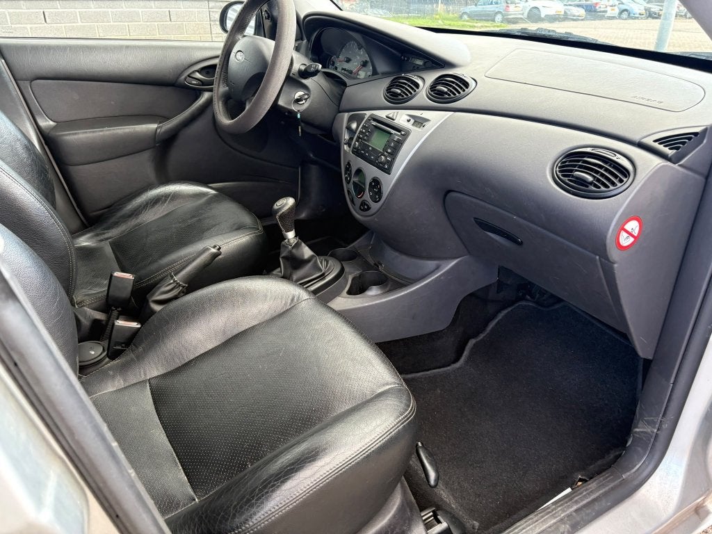 Ford Focus 1.6 I Ghia 2004 Grijs, Auto's, 1596 cc, 15 km/l, 4 cilinders, 100 pk