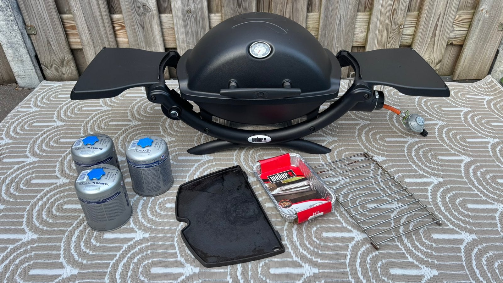 Mooie Weber Q1200 gasbarbecue met plancha en gasflesjes, Ophalen, Zo goed als nieuw
