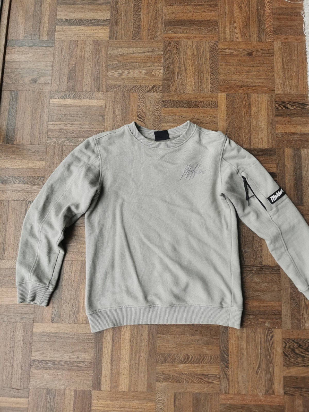 gave malelions trui grijze kleur. 152, Kinderen en Baby's, Ophalen of Verzenden, Zo goed als nieuw, Jongen, Trui of Vest