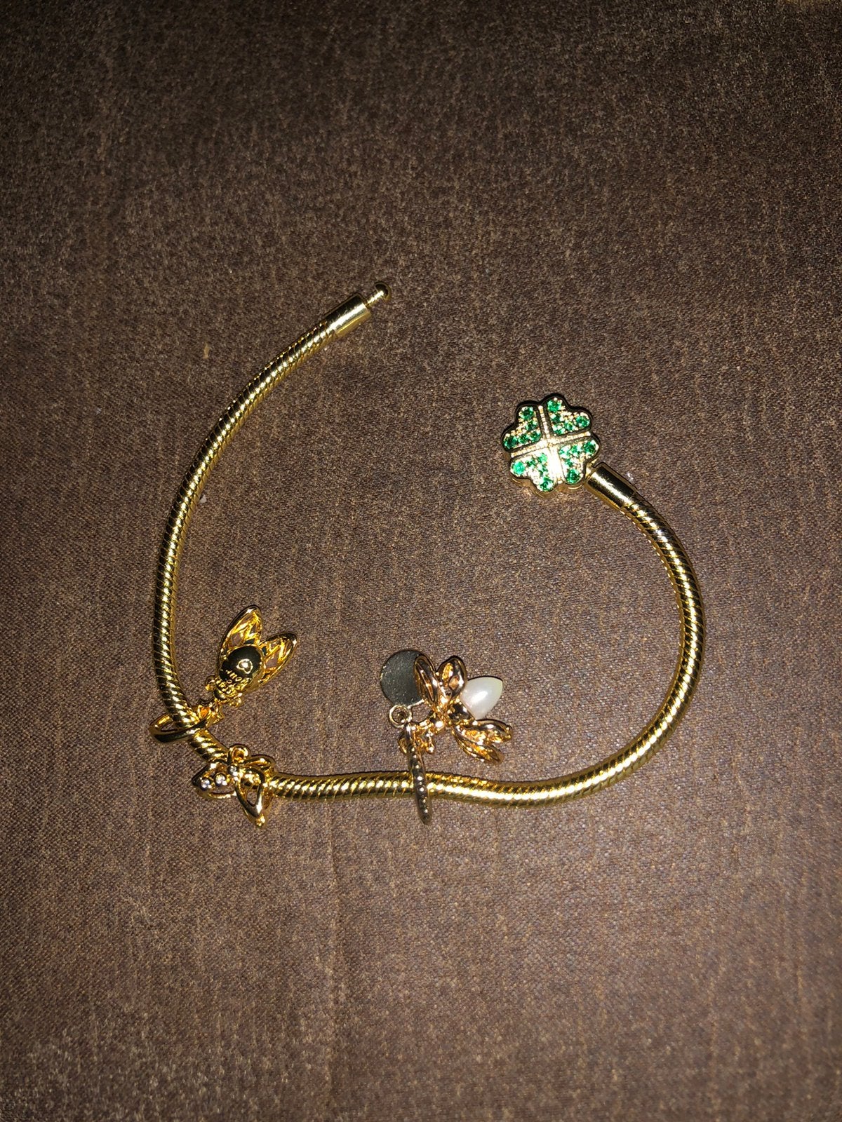 Gouden bedelarmband met zilveren bedels, Pandora, Ophalen of Verzenden, Zo goed als nieuw, 4 bedels of meer