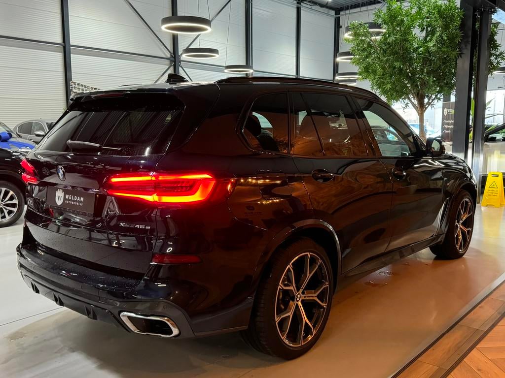 BMW X5 BMW X5 xDrive45e High Executive | M-Pakket | Plug-in, Auto's, BMW, Gebruikt, Met garantie (alle), Blauw, Vierwielaandrijving