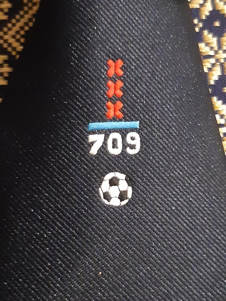 Amsterdam 709 Voetbaltoernooi 1984 stropdas blauw, Verzamelen, Merken en Reclamevoorwerpen, Ophalen of Verzenden, Nieuw, Gebruiksvoorwerp