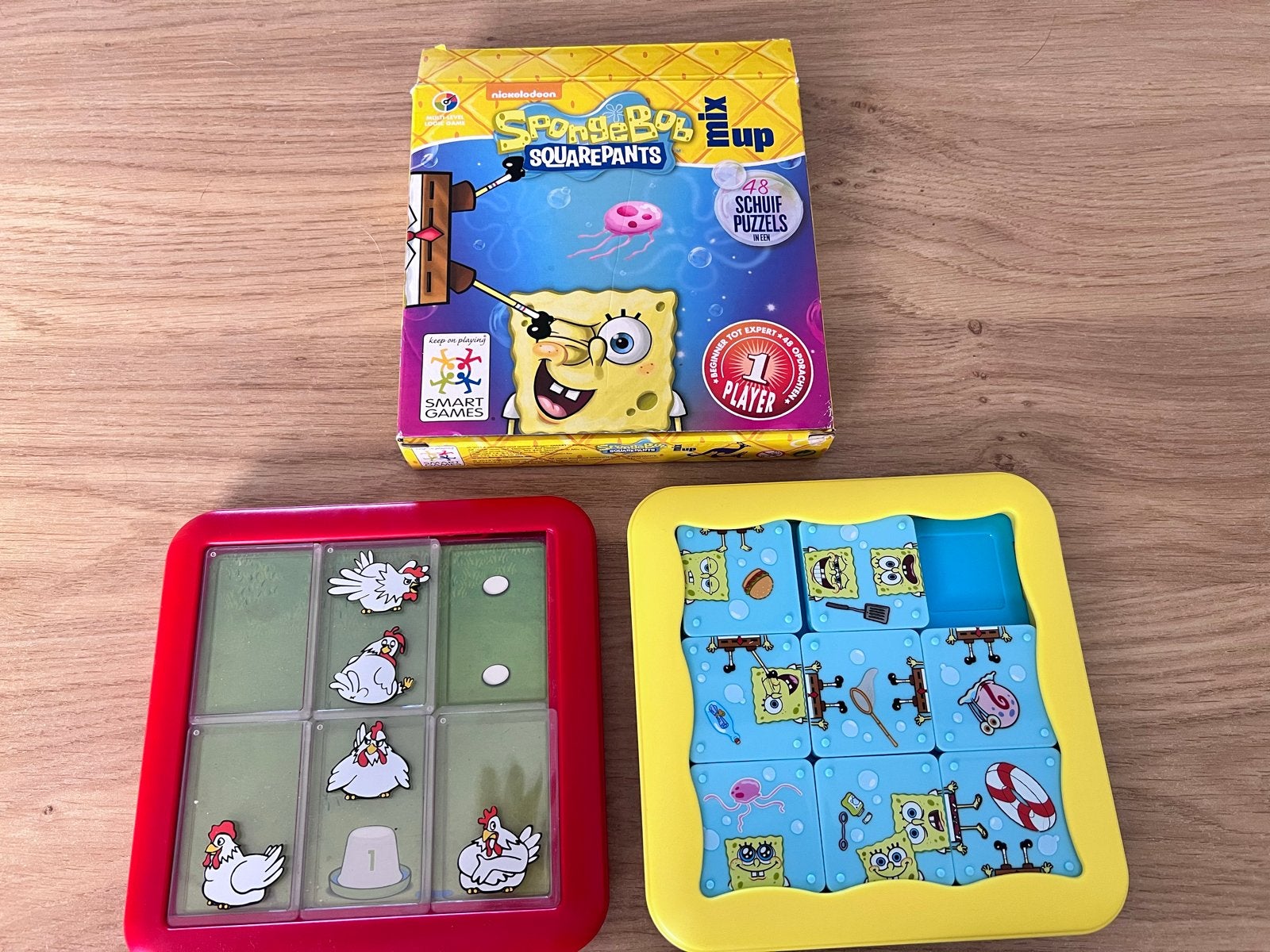 SmartGames Chicken Shuffle en SpongeBob Schuifpuzzel, Ophalen of Verzenden, Minder dan 500 stukjes, Zo goed als nieuw, Overige typen