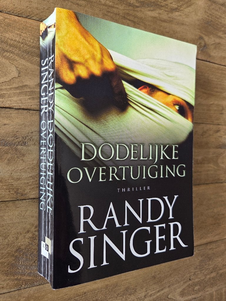 Dodelijke overtuiging - Randy Singer (christelijke thriller), Ophalen of Verzenden, Zo goed als nieuw