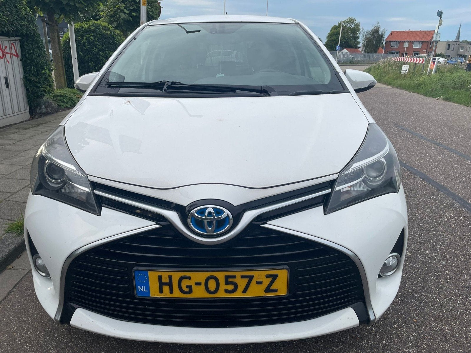 Toyota Yaris 1.5 HSD 55KW 5DRS 2014 Wit, Auto's, 74 pk, Zwart, 4 cilinders, Yaris