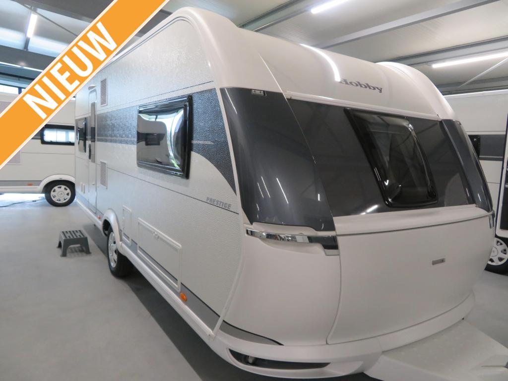 Hobby Prestige 560 UL Gratis Mover, Caravans en Kamperen, Schokbreker, Rondzit, Hobby, 6 tot 7 meter