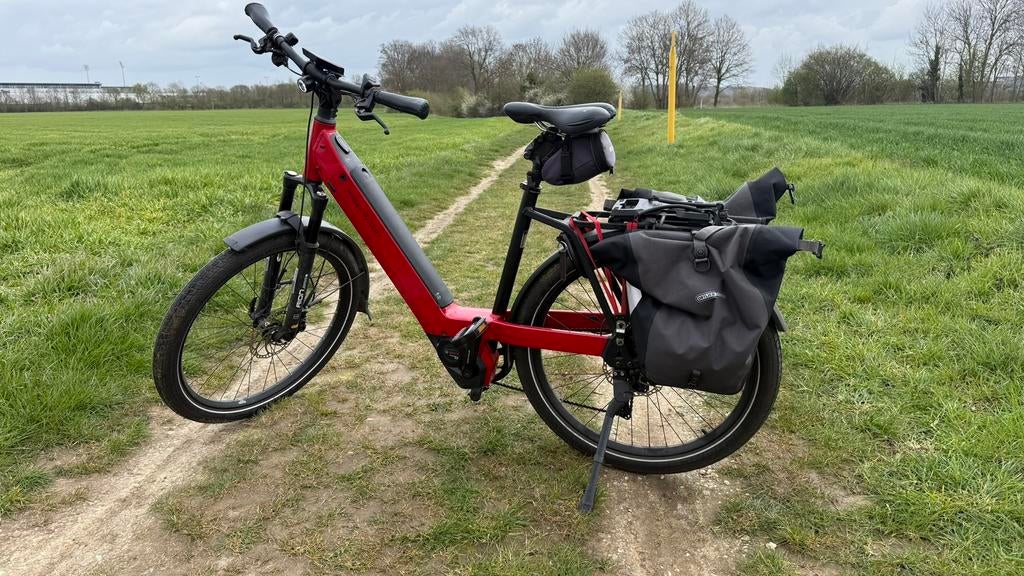 Riese en Muller Nevo3GT touring rood, Fietsen en Brommers, Elektrische fietsen, Gebruikt, 50 km per accu of meer, 55 tot 59 cm