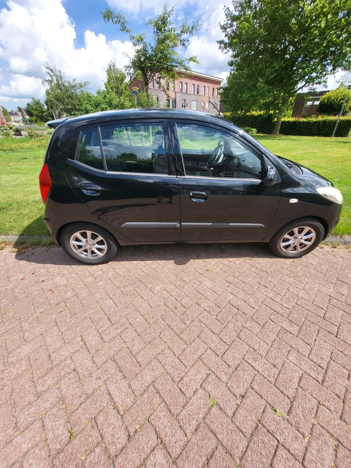 Hyundai i10 1.1 I 5DR 2012 Zwart, Auto's, 4 cilinders, 400 kg, Zwart, Origineel Nederlands