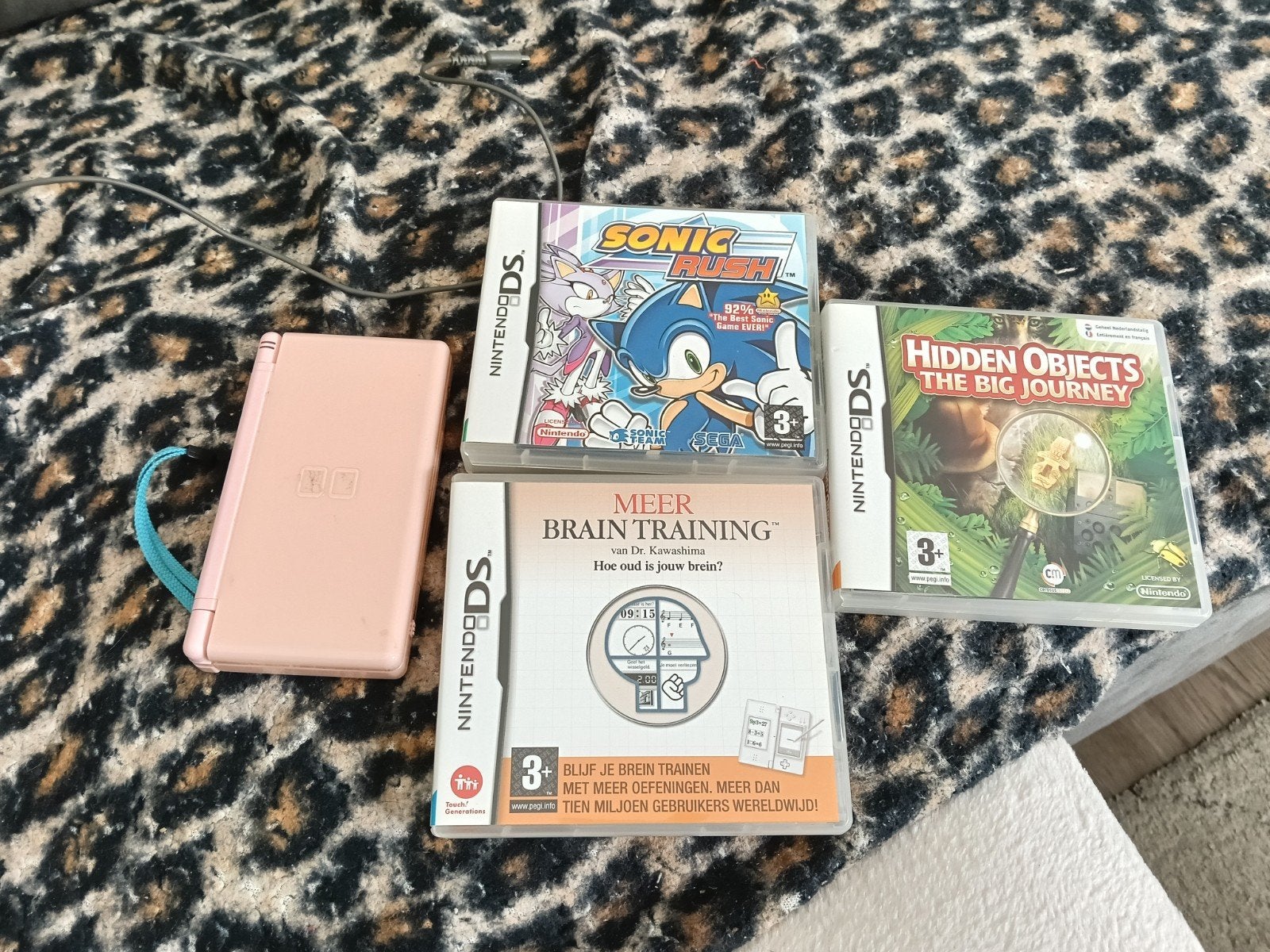 Nintendo DS Lite Roze met 3 games, Spelcomputers en Games, Spelcomputers | Nintendo DS, Ophalen of Verzenden, Zo goed als nieuw