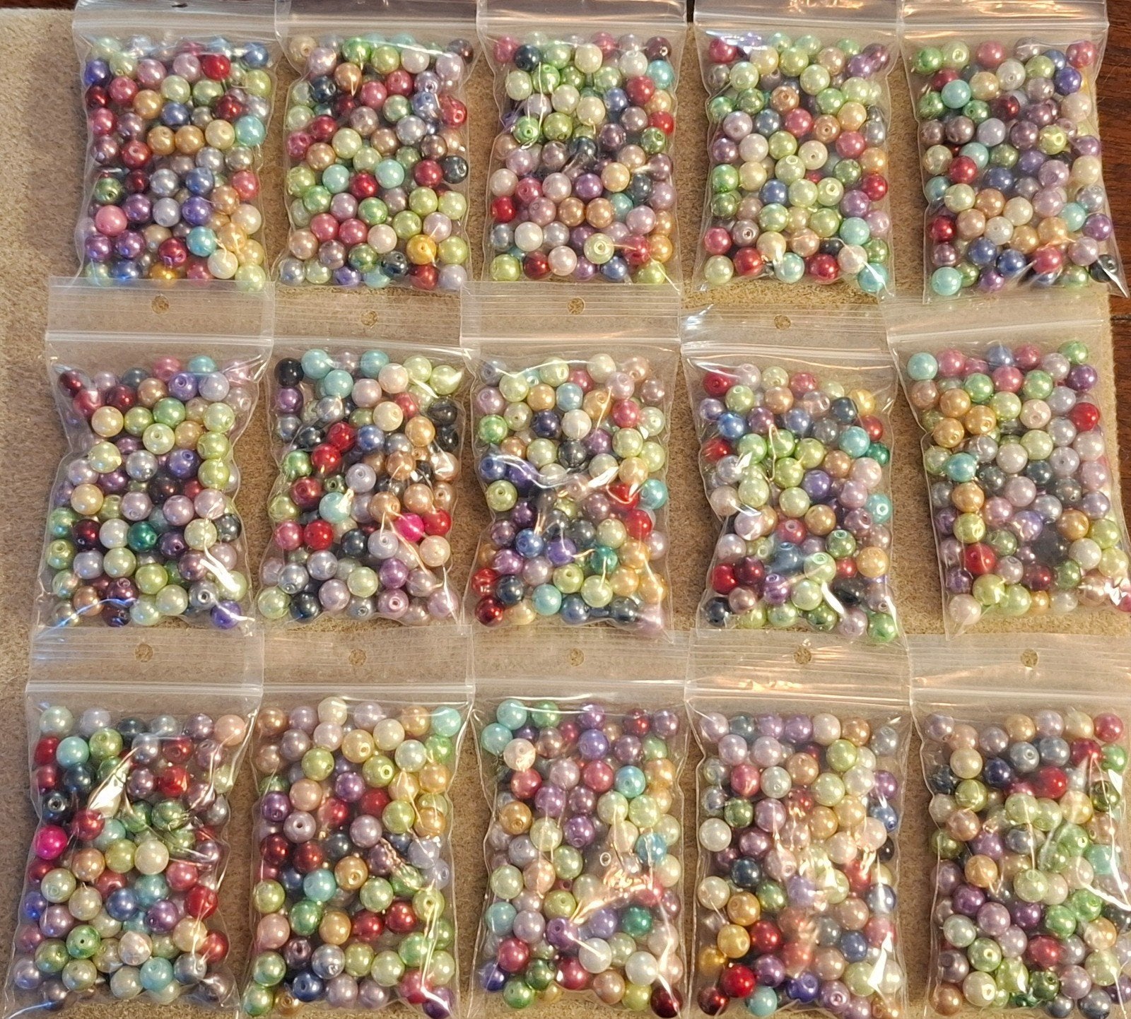 50 verpakkingen met 100 stuks 8mm glasparels voor €40,00, Ophalen of Verzenden, Nieuw