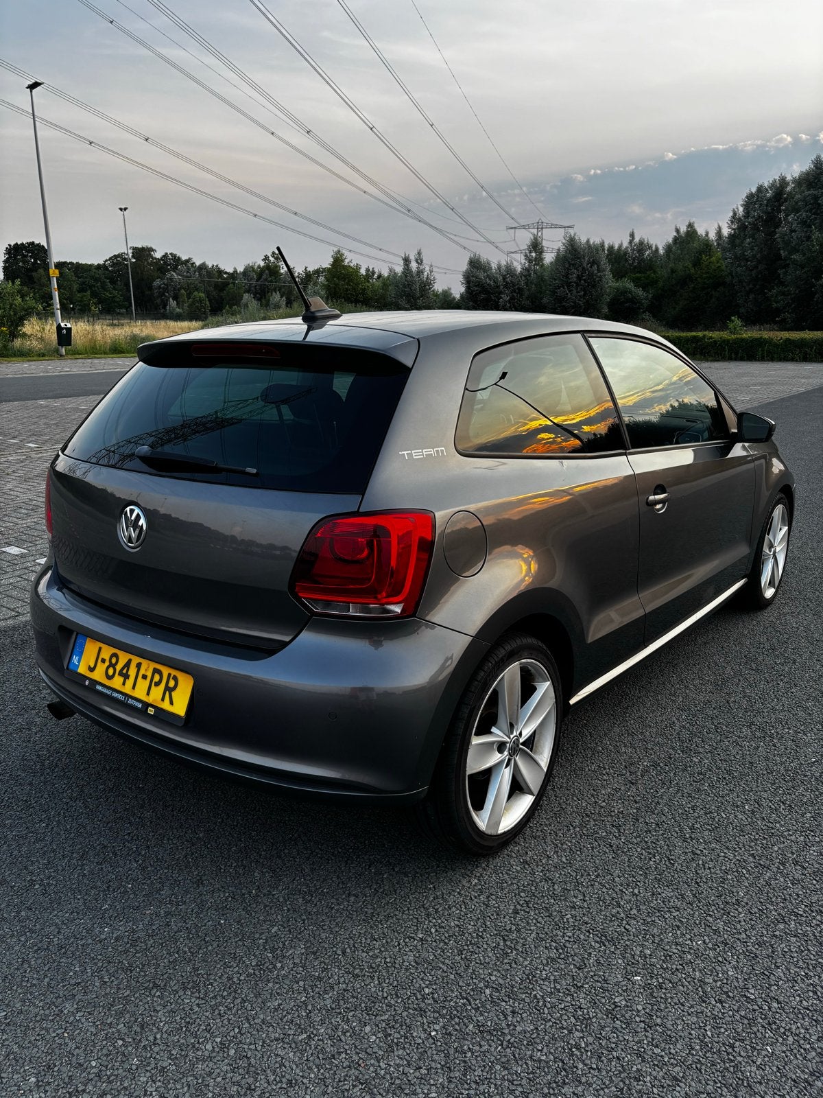 Volkswagen Polo 1.2 TSI 77KW DSG 2010 Grijs, airco (Team), Auto's, Volkswagen, Euro 5, Stof, 40 €/maand, 4 cilinders