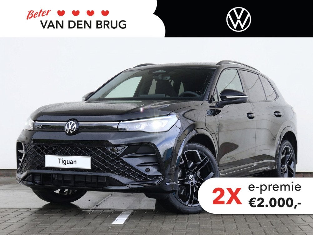 Volkswagen Tiguan R-Line Edition 1.5 eHybrid 204 PK | Naviga, Auto's, Volkswagen, Stof, 150 pk, Zwart, Origineel Nederlands