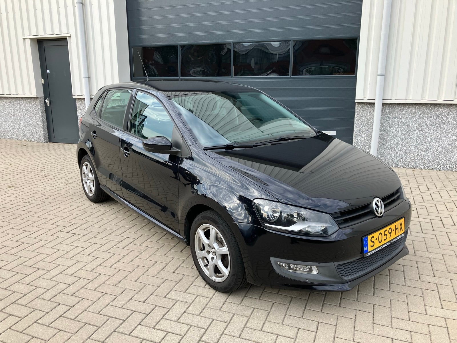 Volkswagen Polo 1.4 16V FSI 63KW 2009 Grijs, Auto's, Voorwielaandrijving, 970 kg, 40 €/maand, Zwart