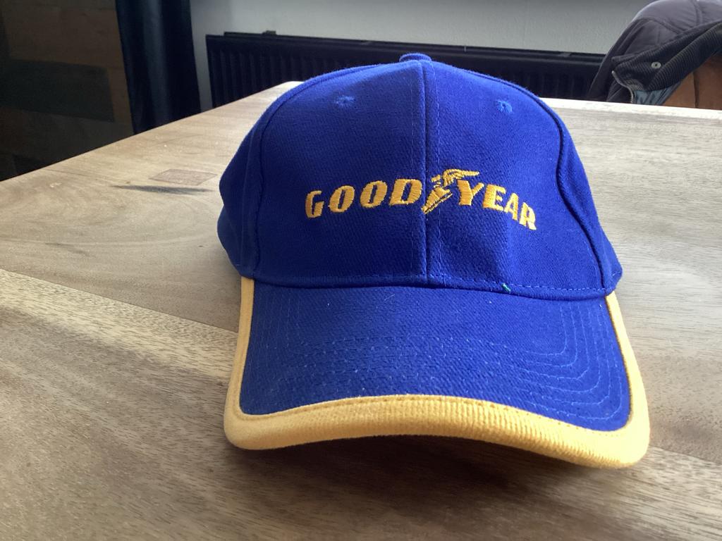 Goodyear pet - Blauw met geel logo, Ophalen of Verzenden, Zo goed als nieuw, One size fits all, Pet